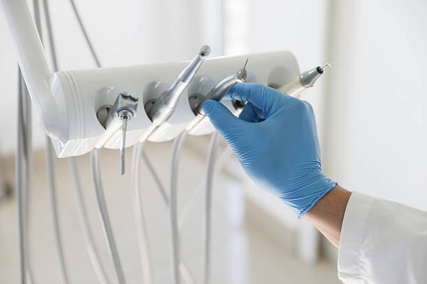 Professional Emergency Dentist technician working in Irvine, CA